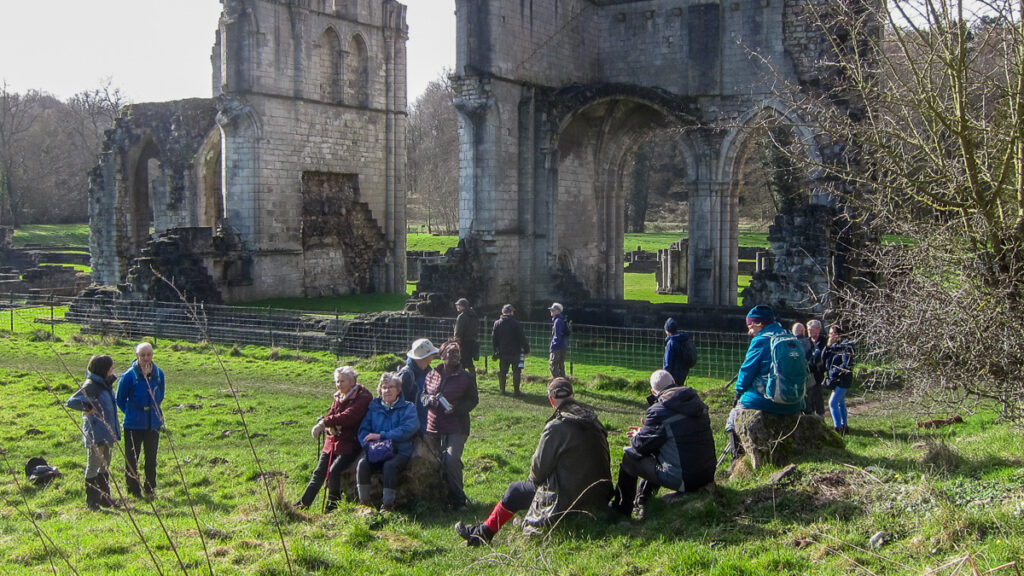 The walking group resting at Roche Abbey