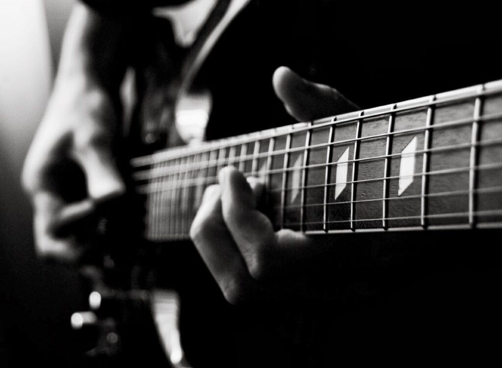 Guitar being picked